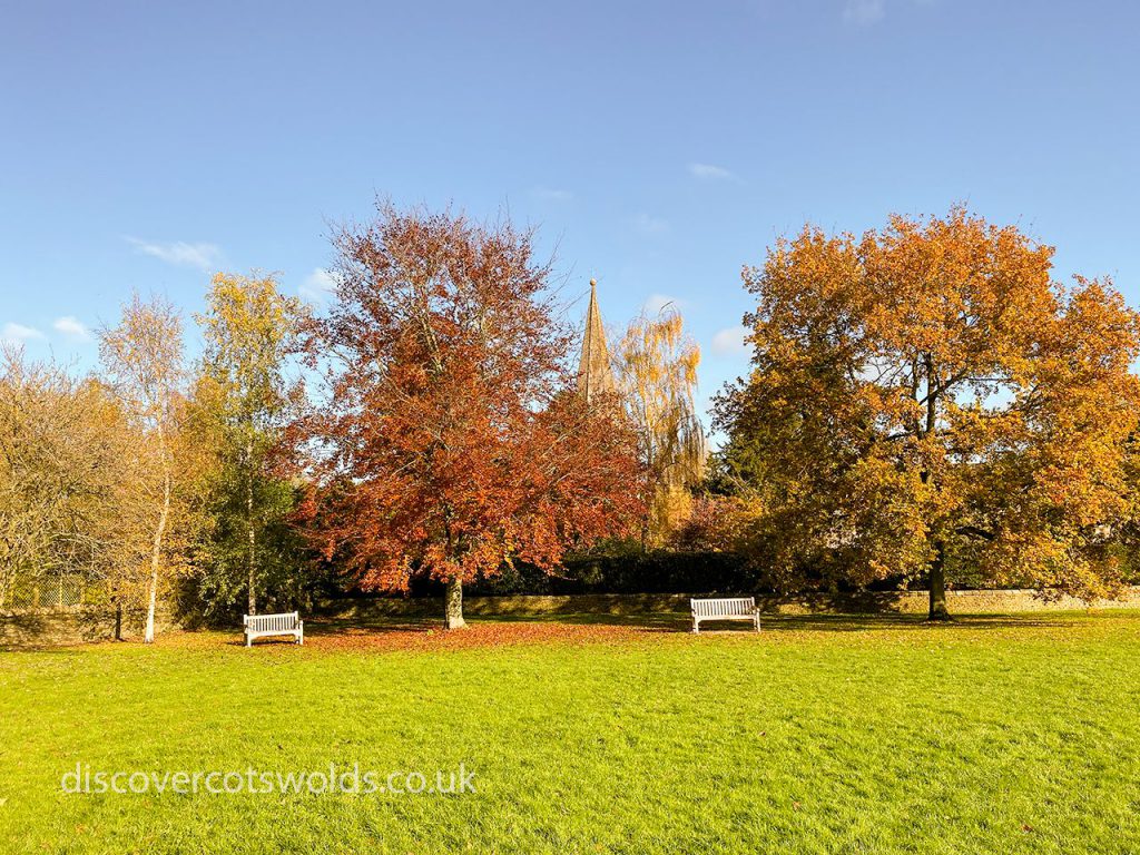 Church Green in Shipton under Wychwood with the church spire visible