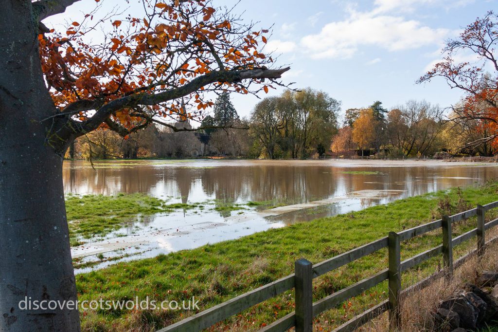 The river Evenlode in flood on the edge of Shipton under Wychwood