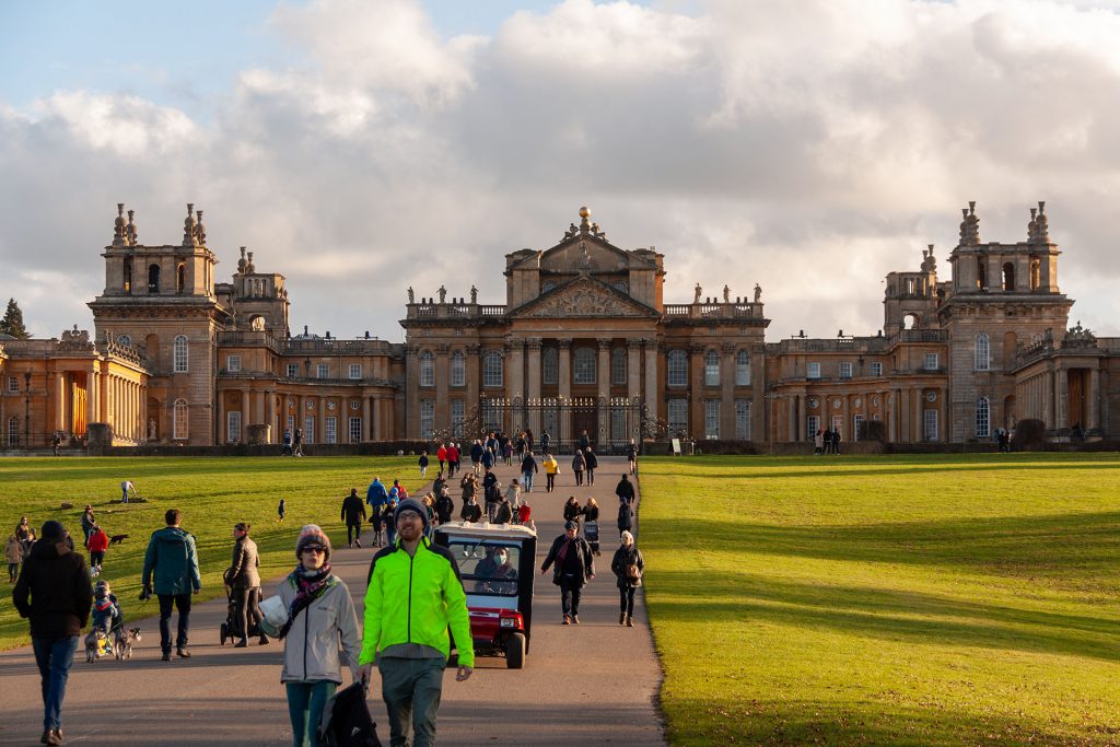 People exploring the expansive grounds of Blenheim Palace