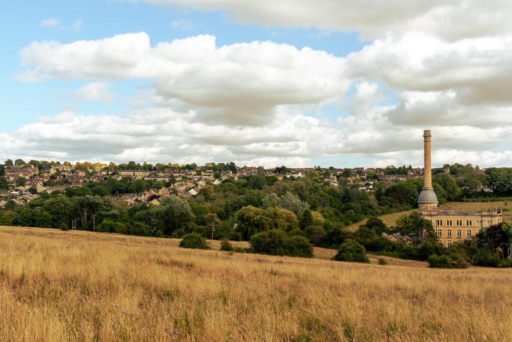Wide shot of Chipping Norton in the distance with Bliss Mill on the left in the foregroun