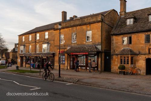 Cyclist passing Hayman Joyce in Broadway